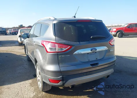 2014 Ford Escape Titanium z USA, uszkodzony, nr VIN 1FMCU0JX4EUB28783
